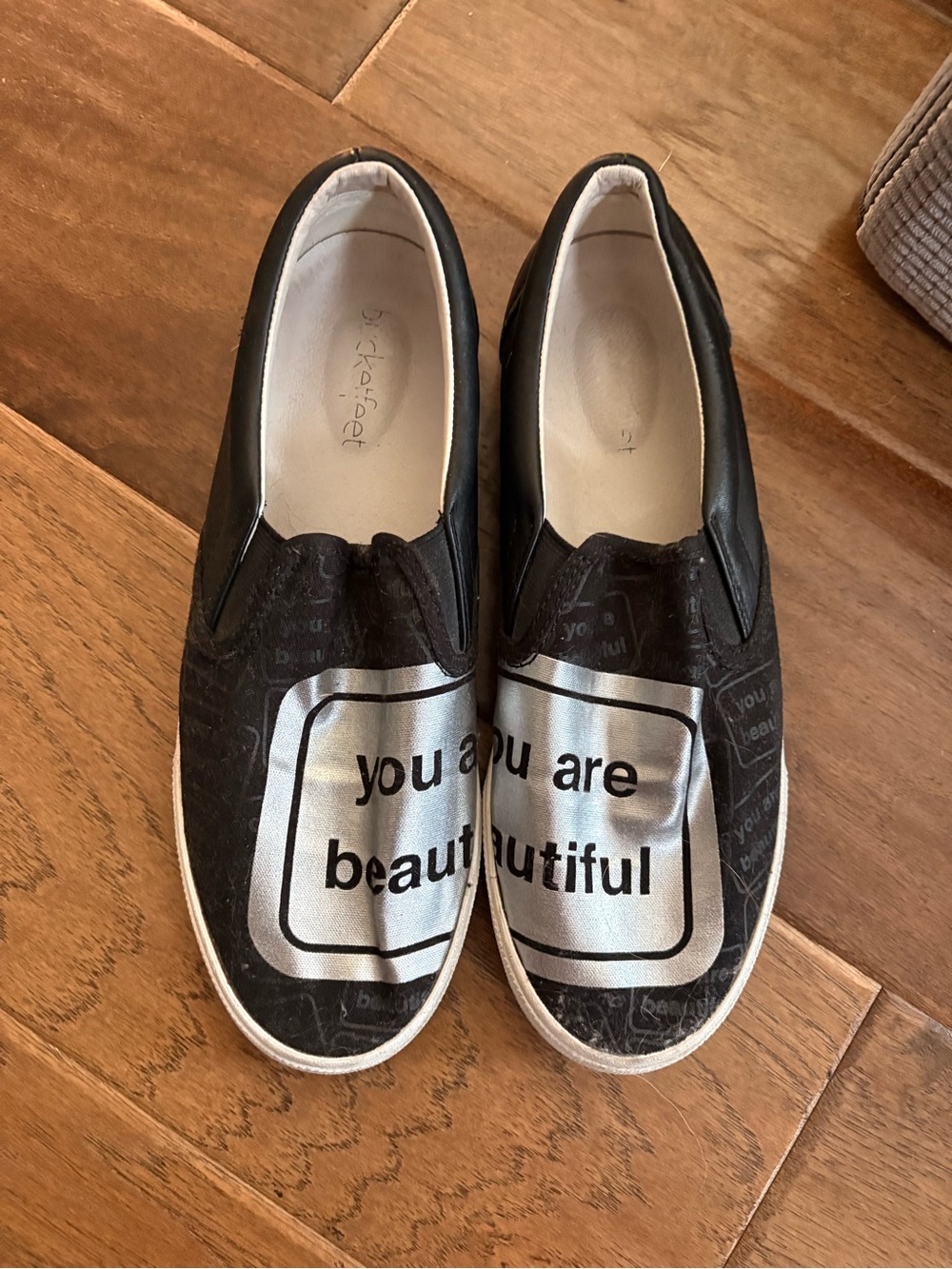 Bucket Feet Black Slip-On Sneakers with Silver 'you are beautiful' Graphic